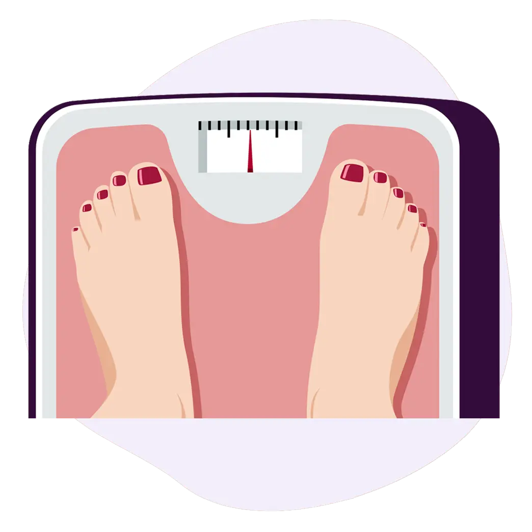 Lady with painted toes in a red color is standing on a scale to check her weight